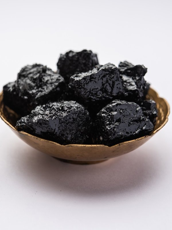 Shilajit is an ayurvedic medicine found primarily in the rocks of the Himalayas. selective focus
