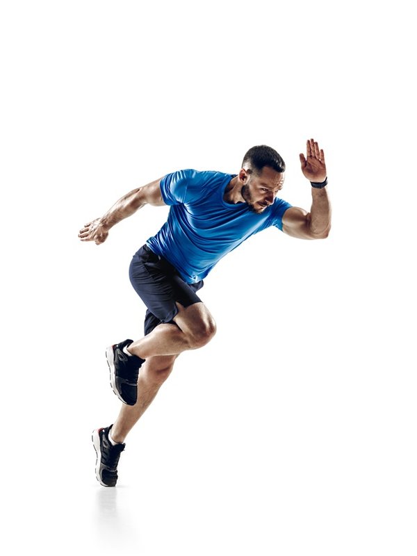 Caucasian professional male runner, athlete training isolated on white studio background. Copyspace for ad.