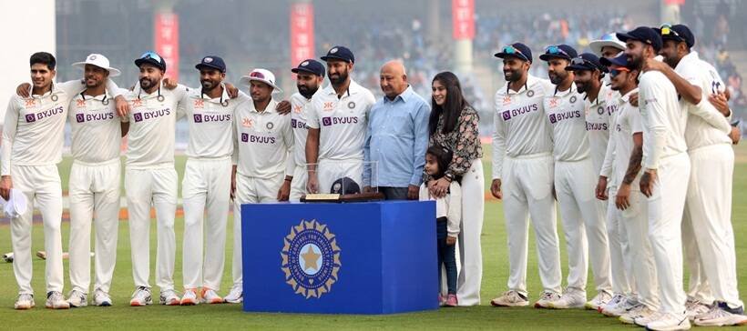 Cheteshwar Pujara with family members and team mates ahead of the 100th Test at Delhi's Arun Jaitley Stadium