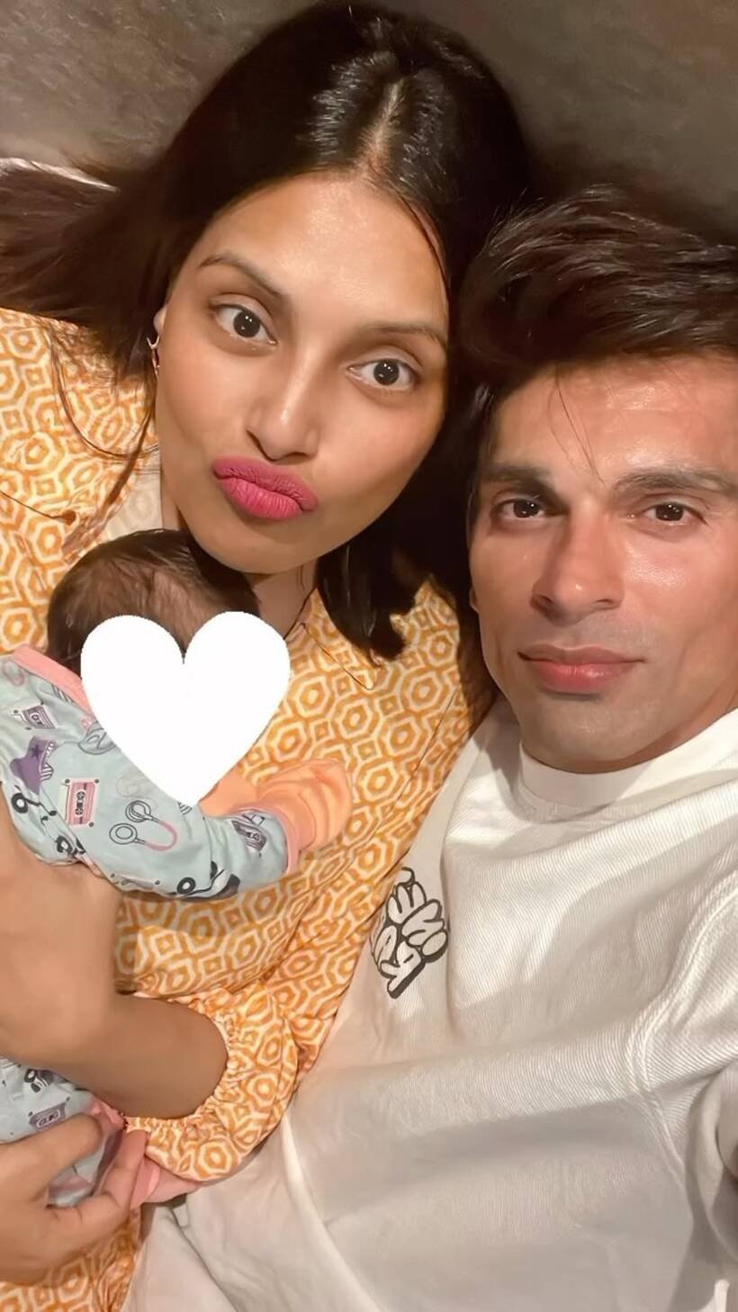 Bipasha basu and karan singh grover with their daughter