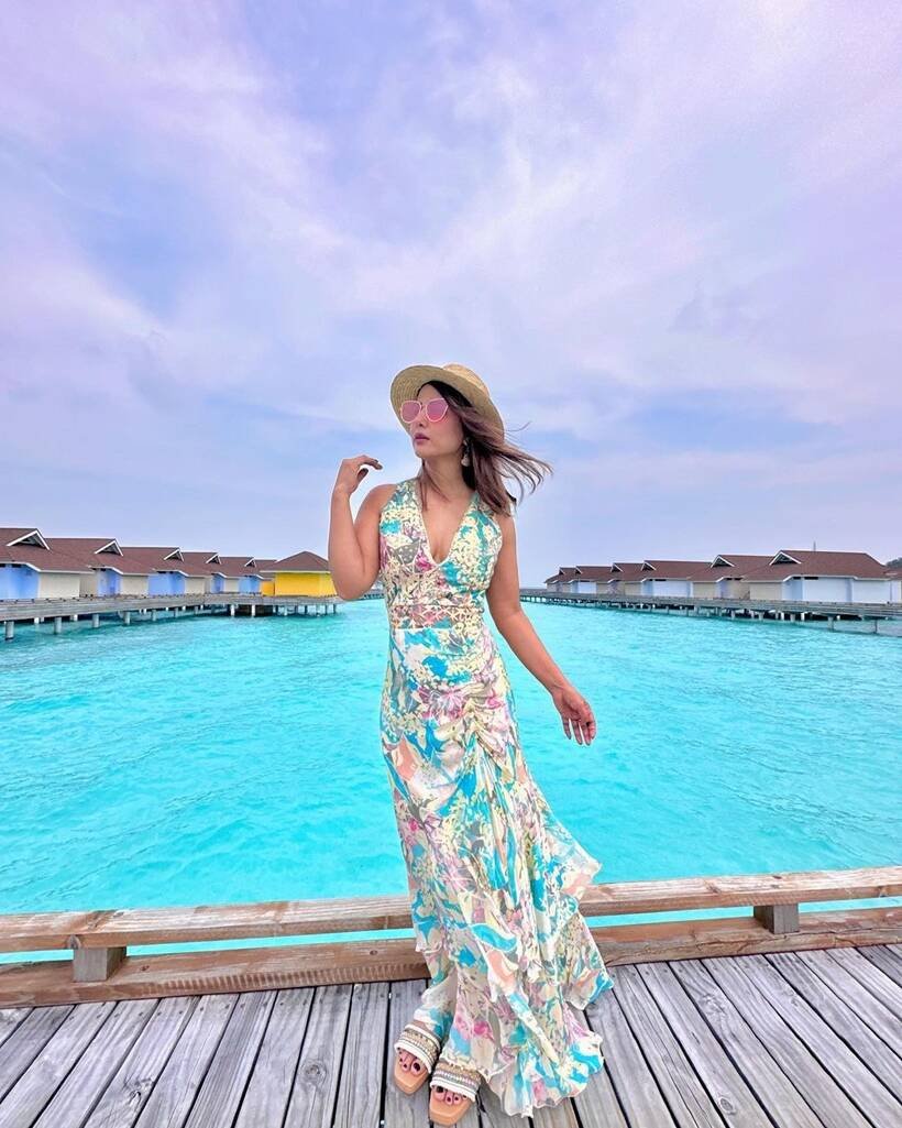 Hina Khan in gown and hat