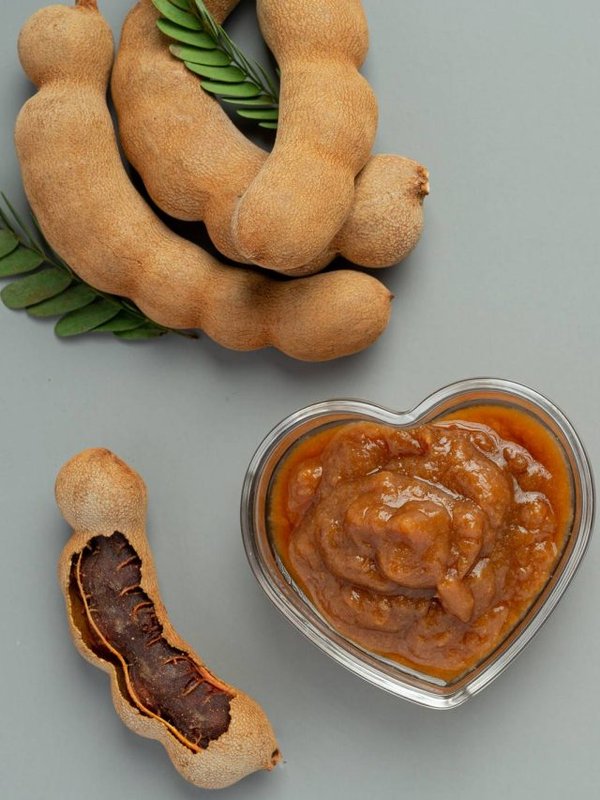 fresh sweet ripe tamarind on gray backgroud