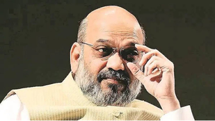 AMIT SHAH