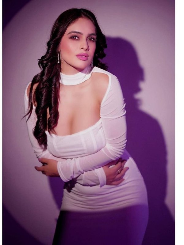 NEHA MALIK IN DEEP NECK DRESS