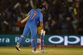 Dhoni with Stumps
