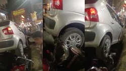 कानपुर में महिला ने खड़ी बाइक पर चढ़ा दी कार, लोग बोले- पापा की परी चला रही गाड़ी