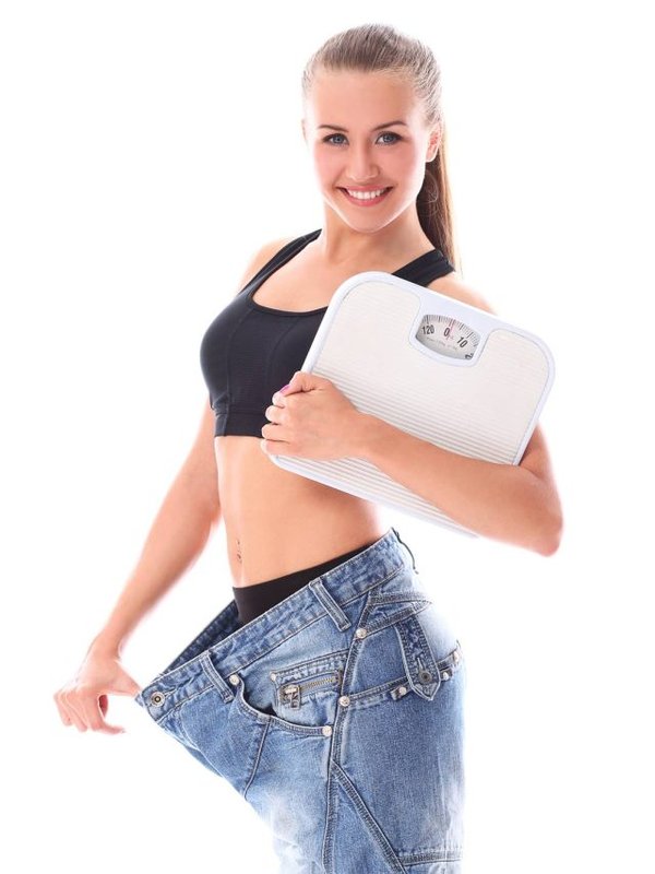 Woman wearing old jeans after weight loss