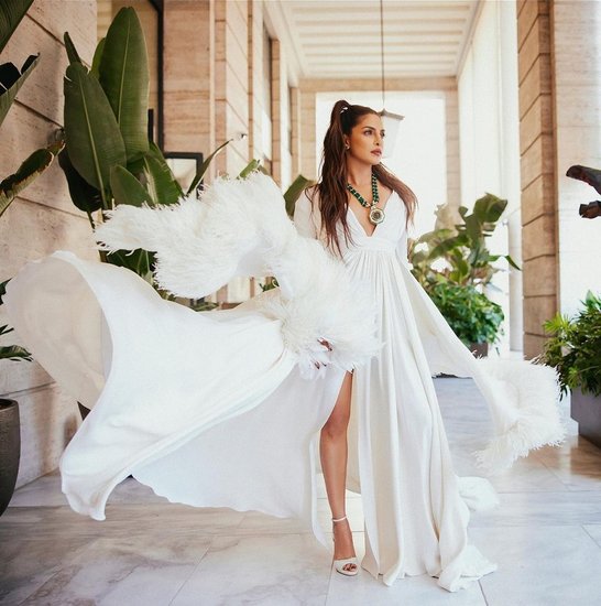 priyanka chopra stuns in white deep neck gown