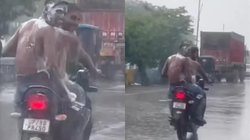 Viral Video: बारिश हुई तो बाइक पर ही नहाने लगे युवक, लोग बोले- आपदा को ऐसे ही अवसर में बदले