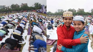 People embrace each other after offering namaz
