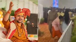 आचार्य धीरेंद्र शास्त्री की कथा में पहुंची लड़की को बैरिकेड से फेंकने का वीडियो वायरल, भड़क गये लोग