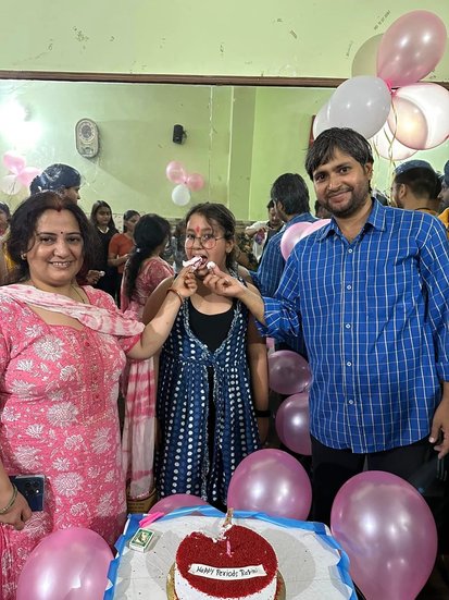Menstruation celebrated by cutting cake