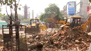 delhi demolition| AAP| LG saxena