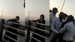 ब्रिज पर खड़ी होकर समुद्र में कूदने जा रही थी महिला, पुलिसकर्मी ने बचाई जान; देखिए वीडियो