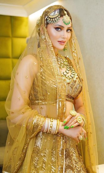 Urvashi Rautela in Golden Lehenga