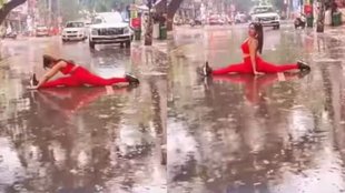 woman performing yoga| woman booked| yoga on road