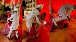 रोमांटिक फोटोशूट करवा रहे थे दुल्हा-दुल्हन, स्टेज पर ही गिरे; वीडियो हो रहा वायरल