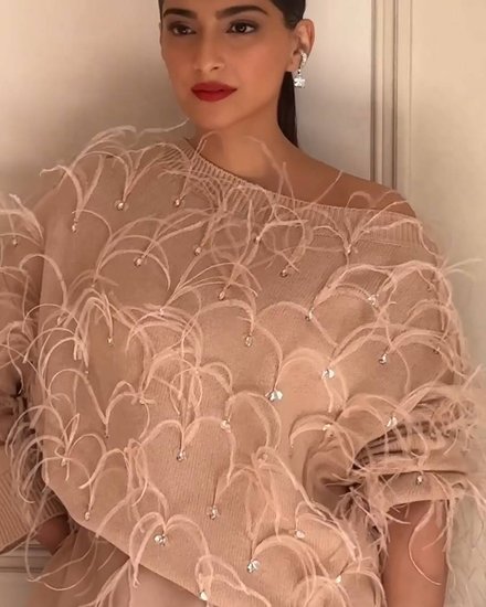 Sonam Kapoor wears sweater At Paris Fashion Week