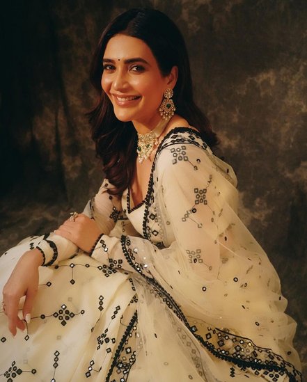 Karishma Tanna in white lehenga