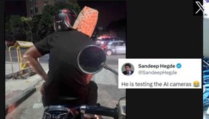 Bengaluru man rides pillion with paper bag