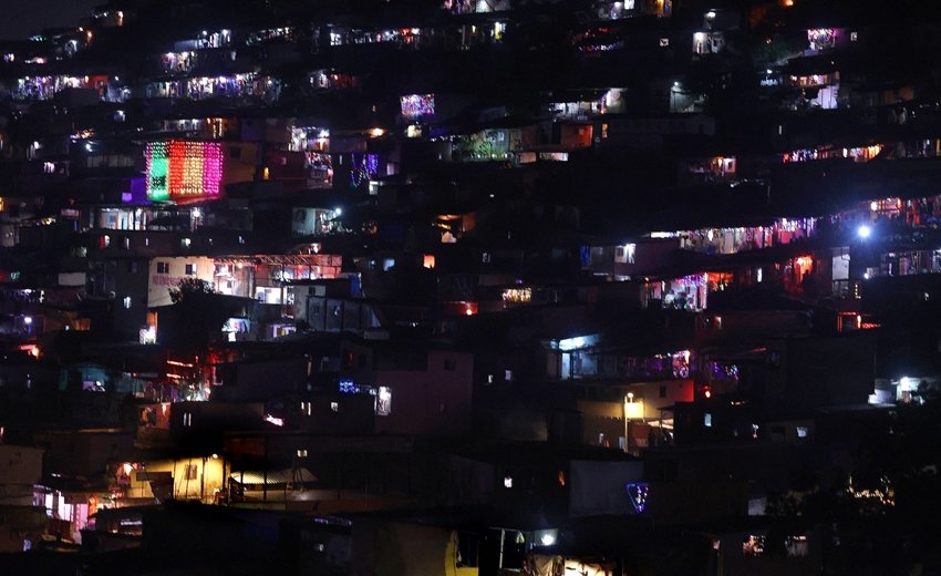 slum colony is decorated with lanterns and lights