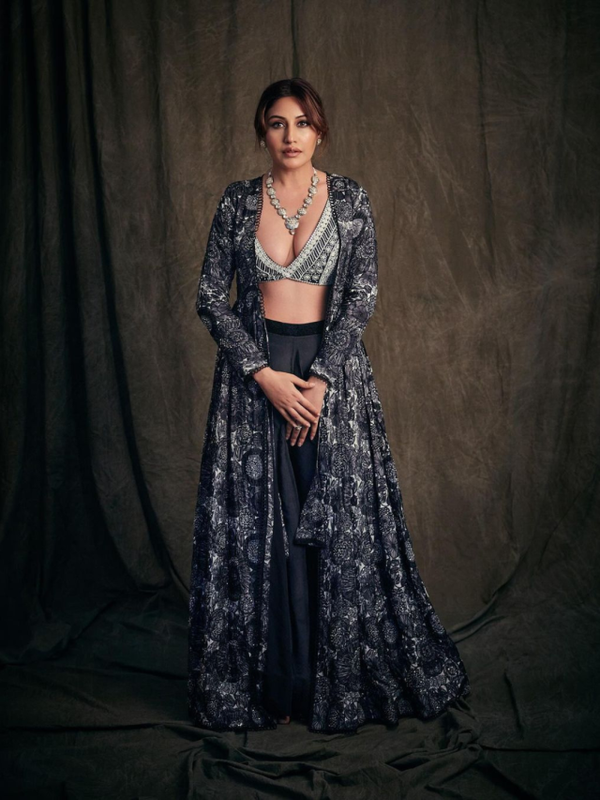 Surbhi Chandna looks glamorous in black dress, deep neck blouse, shrug and skirt