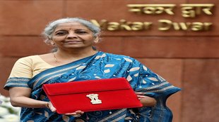 Union Finance Minister Nirmala Sitharaman shows the Budget tablet