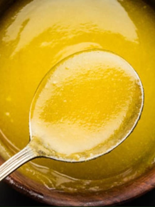 applying ghee on belly button