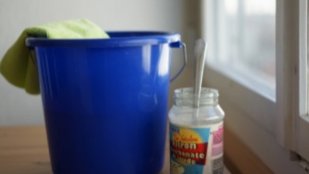 clean bathroom buckets and mugs