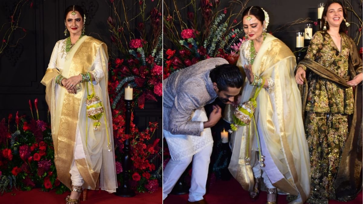 Siddharth touches feet of Rekha Siddharth touches feet of Rekha