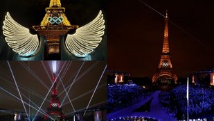 Eiffel Tower illuminates during the Olympic opening ceremony