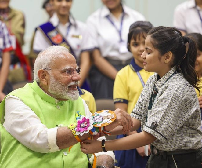 Children tied Rakhi to Pm Modi