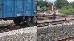 रेलवे लाइन पार करते वक्त महिला का फंस गया पैर, जान जोखिम में डालकर ही बचाई अपनी जान; देखें वायरल Video