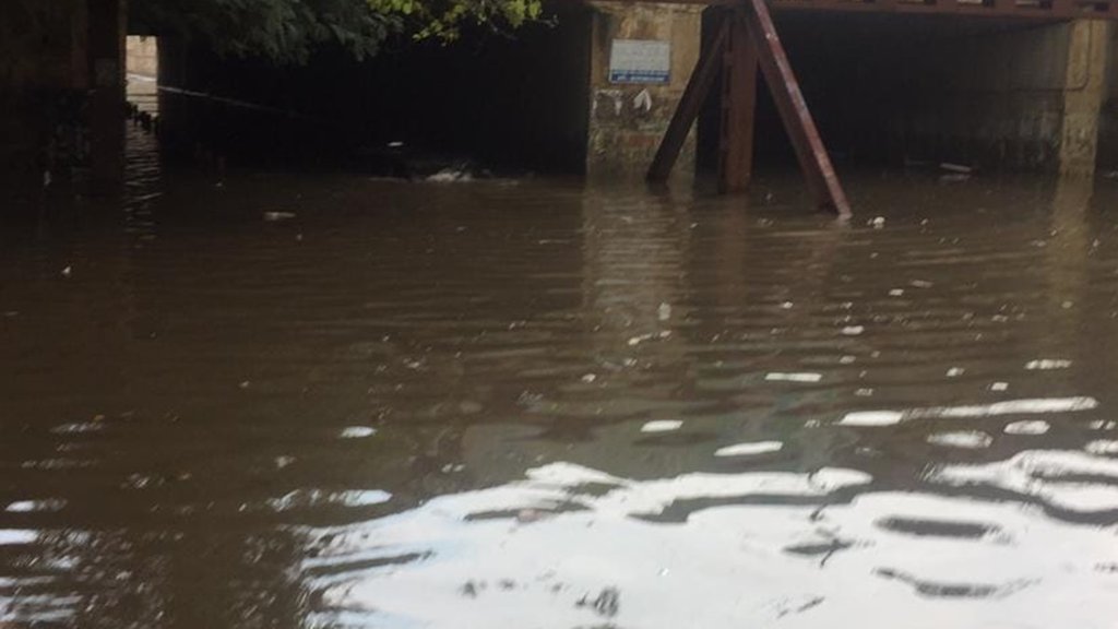 Faridabad, waterlogged Old Faridabad Railway underpass, Car Submerged