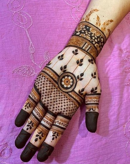 Full-hand mehndi designs for jivitputrika