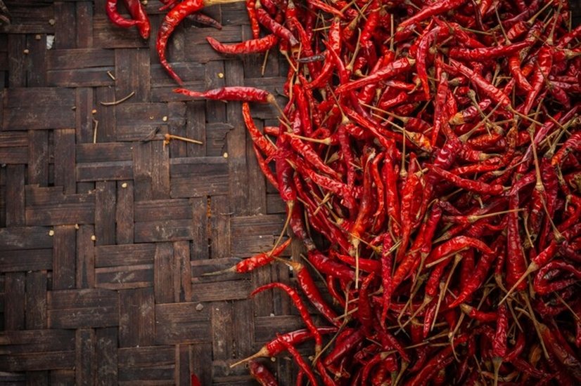 red-dried-chilies-placed-space-weave