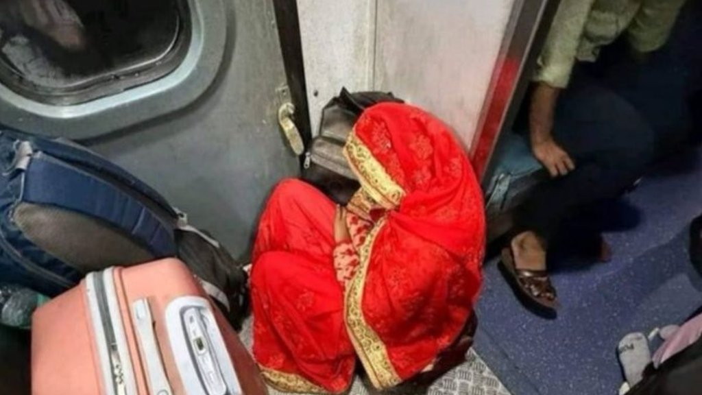 Indian Railway, woman sitting near toilet in train