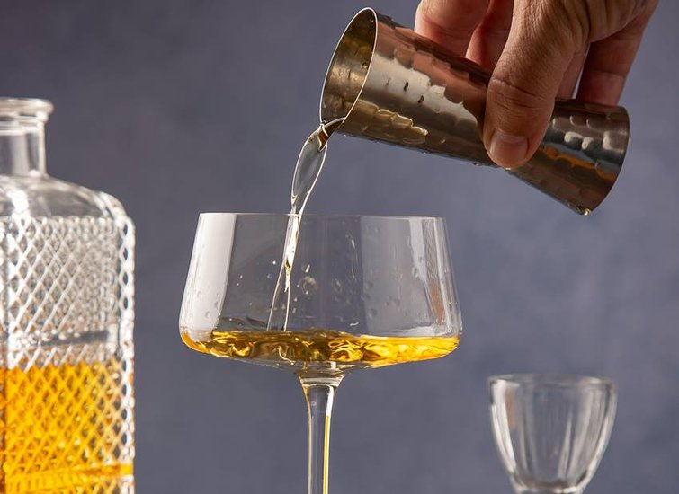 Why drink rum with hot water