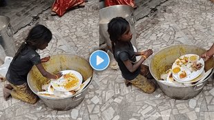 Sad video, girl Sad video, girl eating from waste