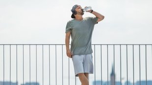 drinking water while standing