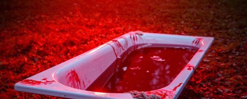 Bathtub filled with blood. Horror Concept.