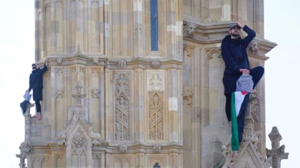 Man climbs Big Ben ,Big Ben Man with Palestinian flag ,