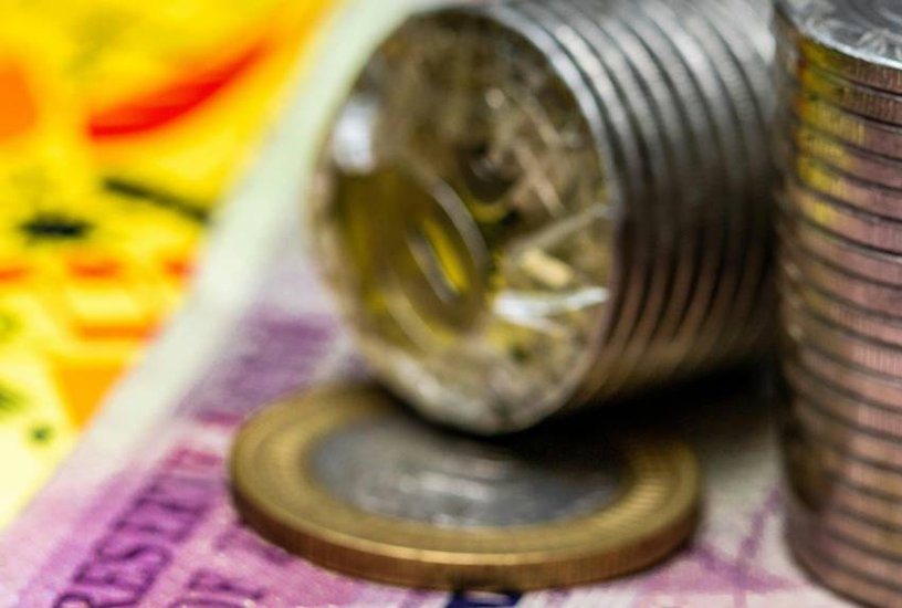 10 rs coin making cost in india