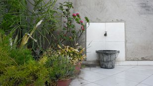 Remove soap scum from bucket
