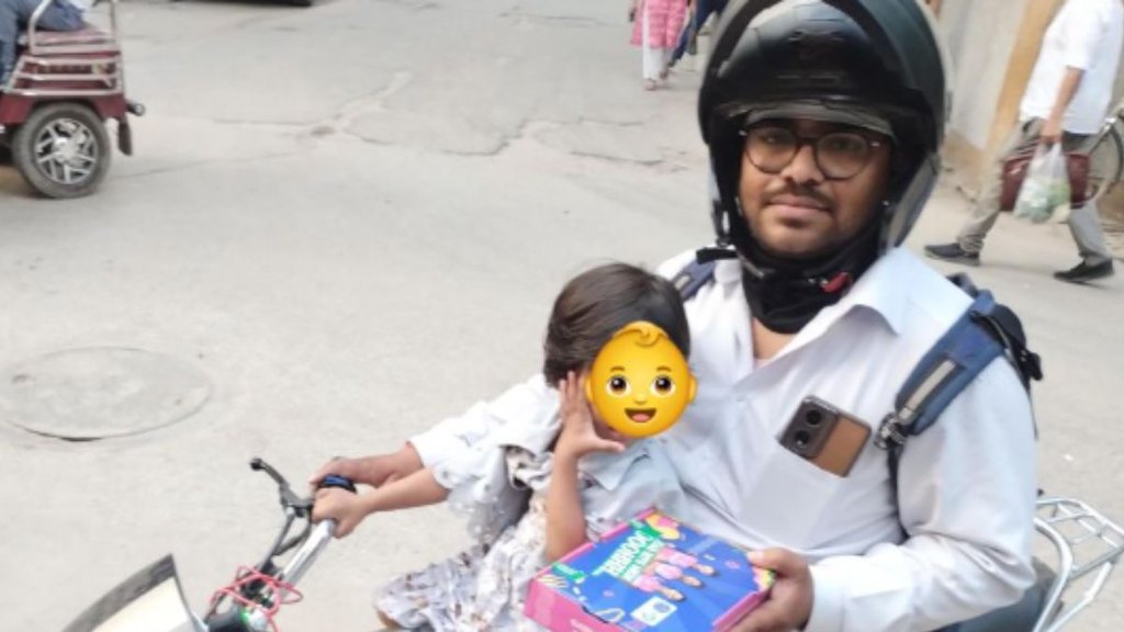 Swiggy delivery agent,swiggy agent gets 2 year old daughter to work,Viral post