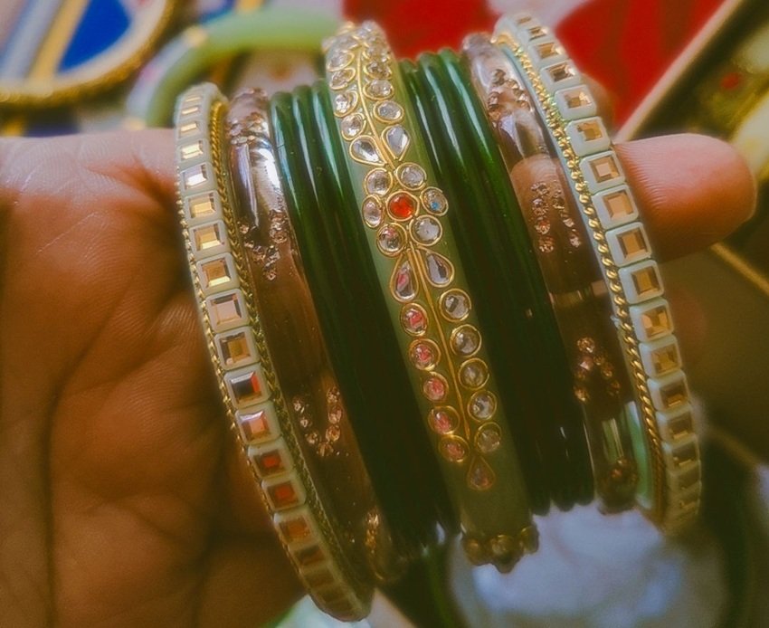 14 thin bangles or broad bracelets