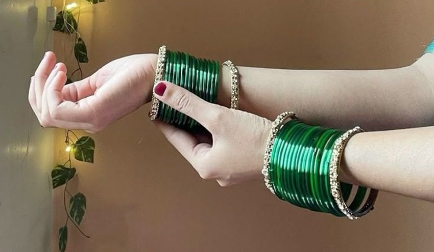 2 thin green glass bangles
