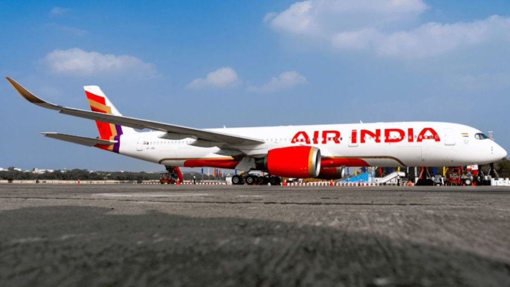 air india | flight catches fire | igi airport |