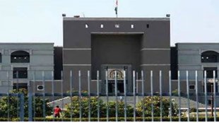 Gujarat High Court, drinking from beer mug,