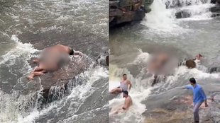 Viral Video, boys lying in waterfall, inappropriate men lying waterfall